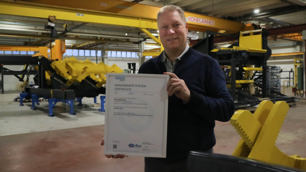 In this picture Ferroplan's CEO Antti Rousu with the ISO 9001 certificate in his hands.